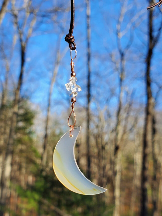 Made-to-Order Wire wrapped Iris Agate Moon Ornament . Window display. Copper. Herkimer diamonds. Leather. Red/Green Velvet Ribbon.