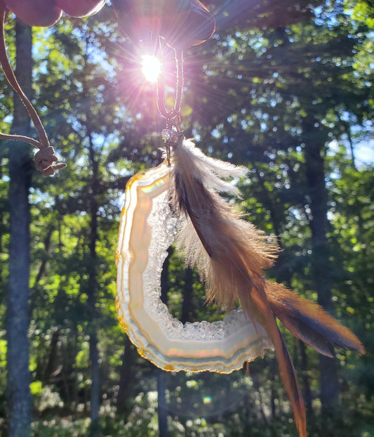 Iris Agate Window Display. SUNCATCHER. RAINBOW Crystal. Pheasant Feathers, Leather Cord.